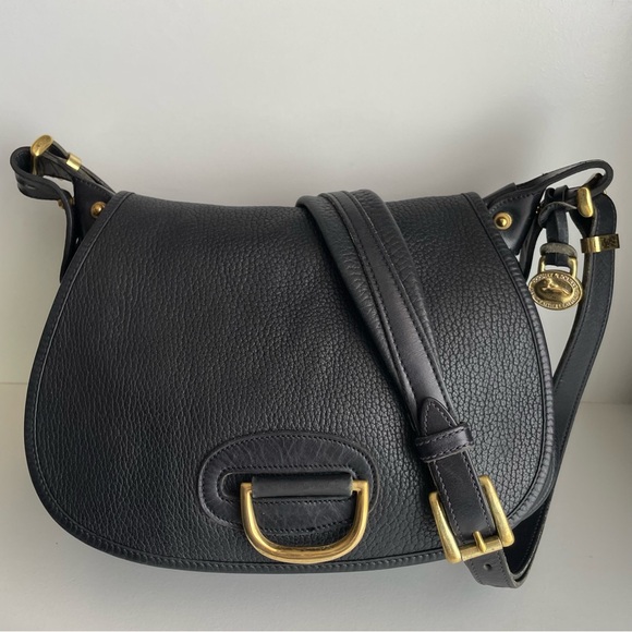 Dooney & Bourke Handbags - Dooney and Bourke black leather horseshoe saddle bag awl